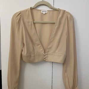 Cropped long sleeve nude top